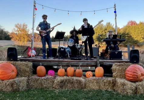Kyle Stavrou, Charlotte Zoller, Joseph Zoller, and Noah Felber perform at their Great Pumpkin Concert.